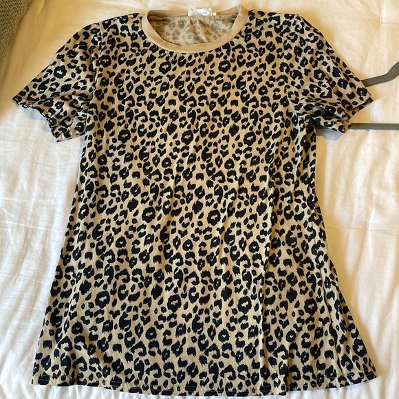 Tops - Leopard print shirt.